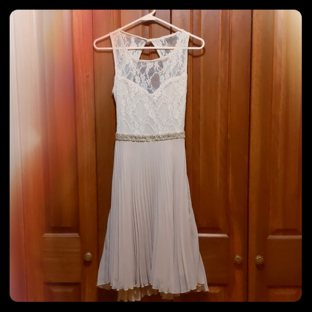 Stunning cream lace and pleated dress